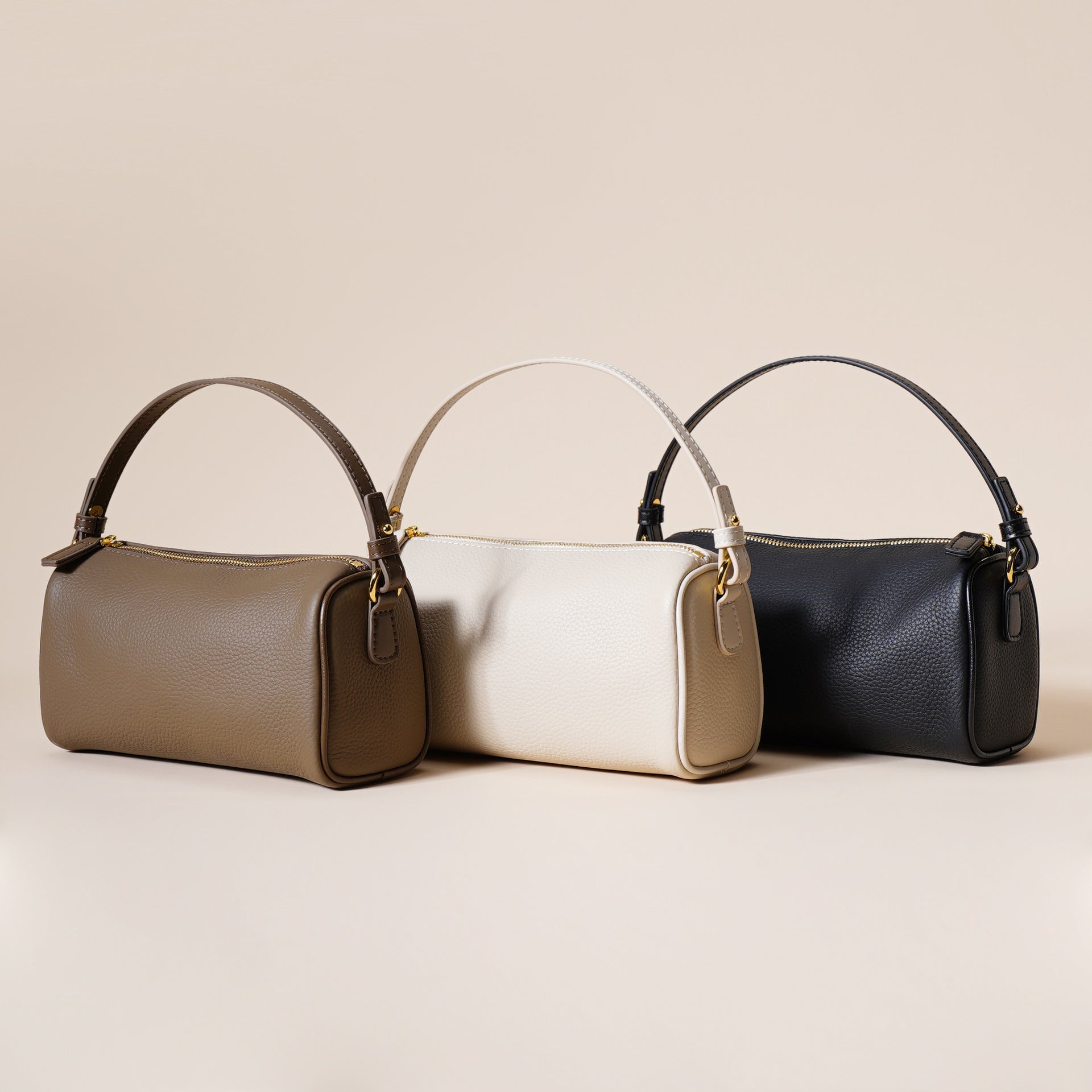 LORIAN leather crossbody bags in taupe, cream and black